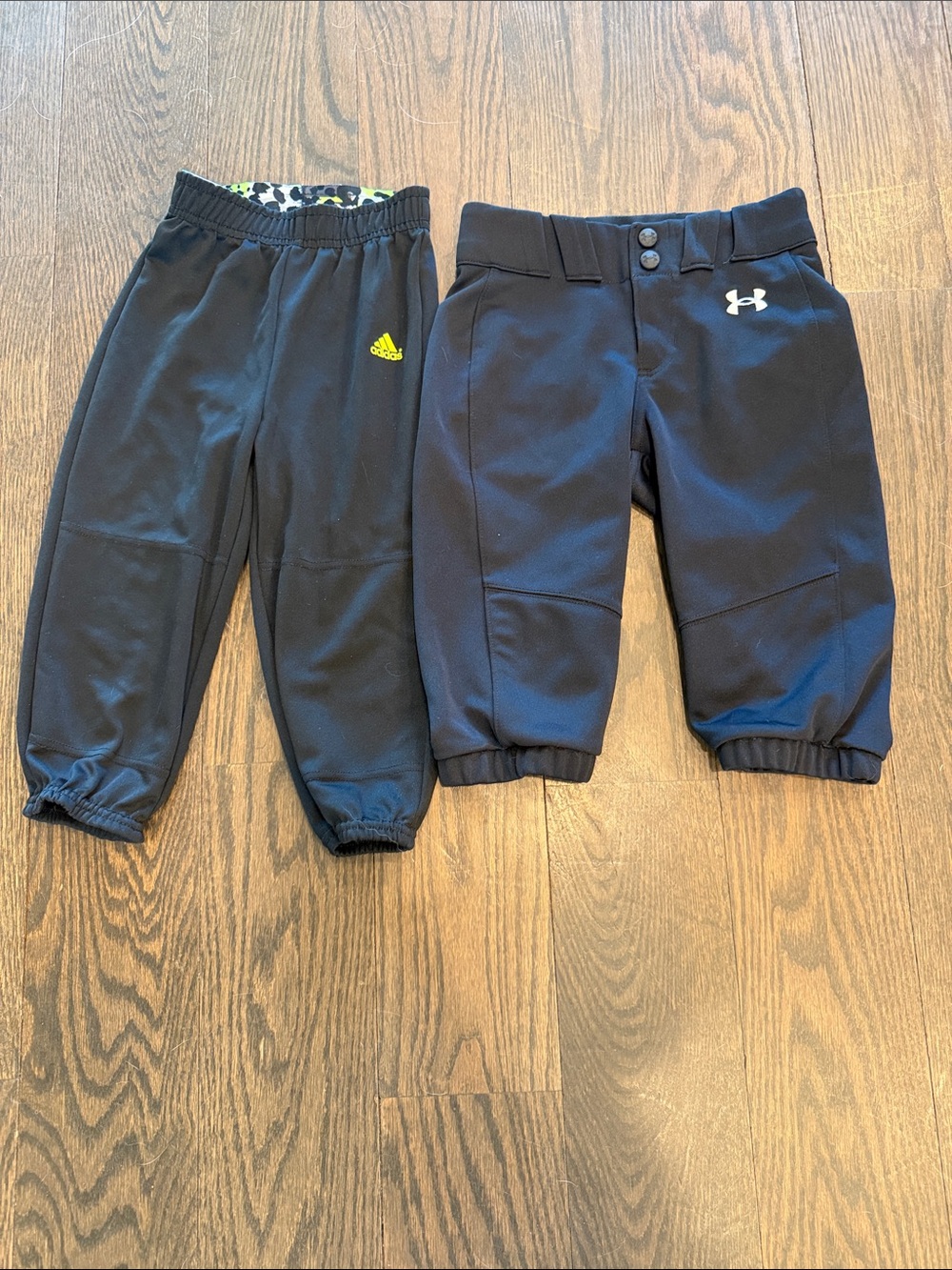 Under Armour and Adidas softball pants